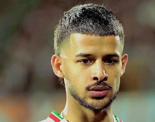 مهدی قایدی در امارات کاریکاتور شد